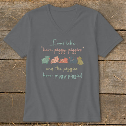 Gray v-neck t-shirt with text and cartoon pigs: "I was like "here piggy piggies" and the piggies here piggy piggied."