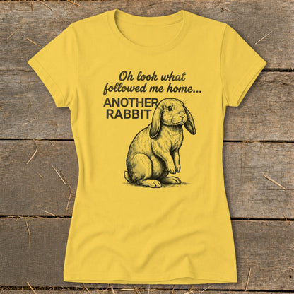 Yellow t-shirt with drawing of a lop-eared rabbit and text "Oh look what followed me home... ANOTHER RABBIT".