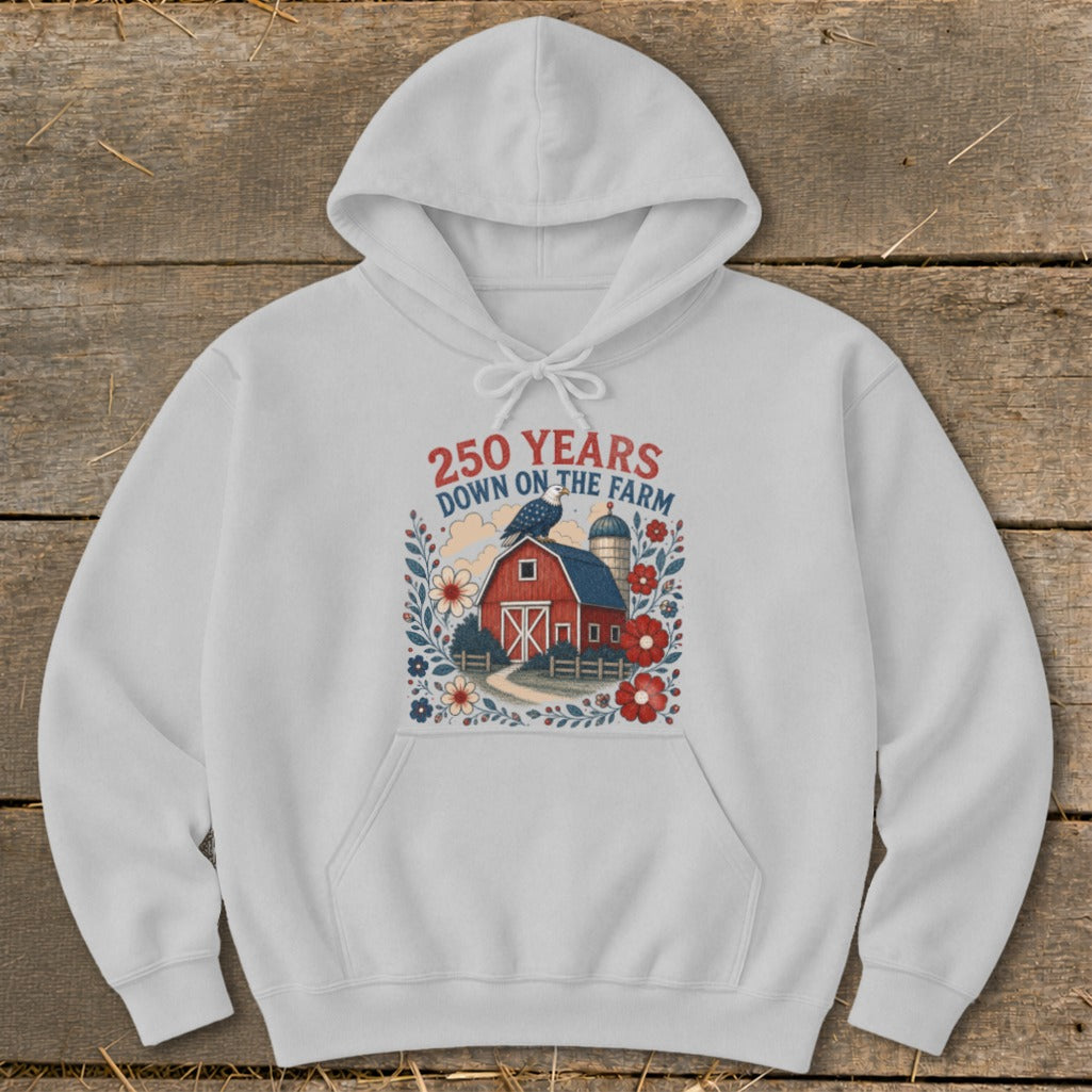 White hoodie with a graphic of a red barn, silo, and text "250 YEARS DOWN ON THE FARM".