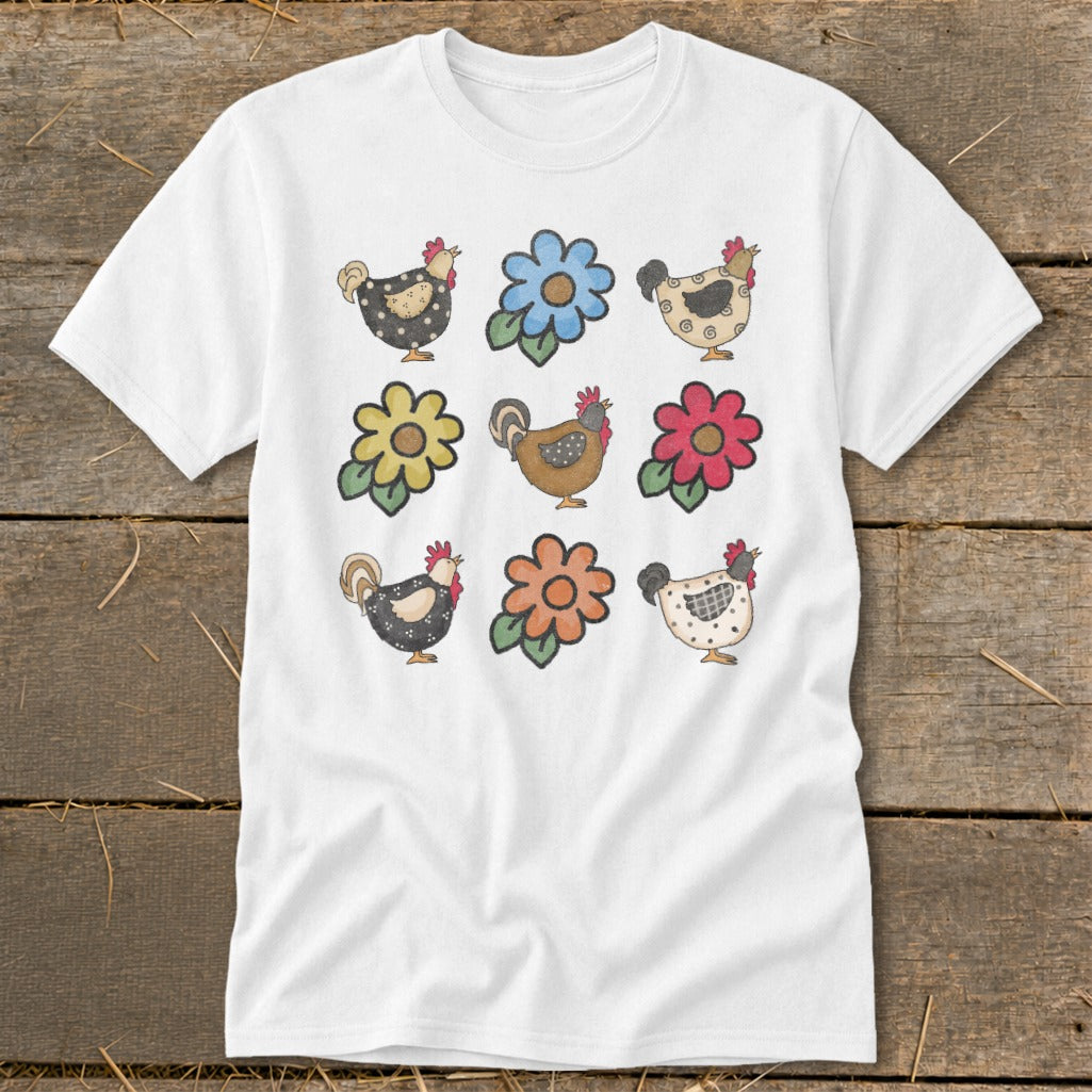 White t-shirt with a grid of six illustrated chickens and three flowers.