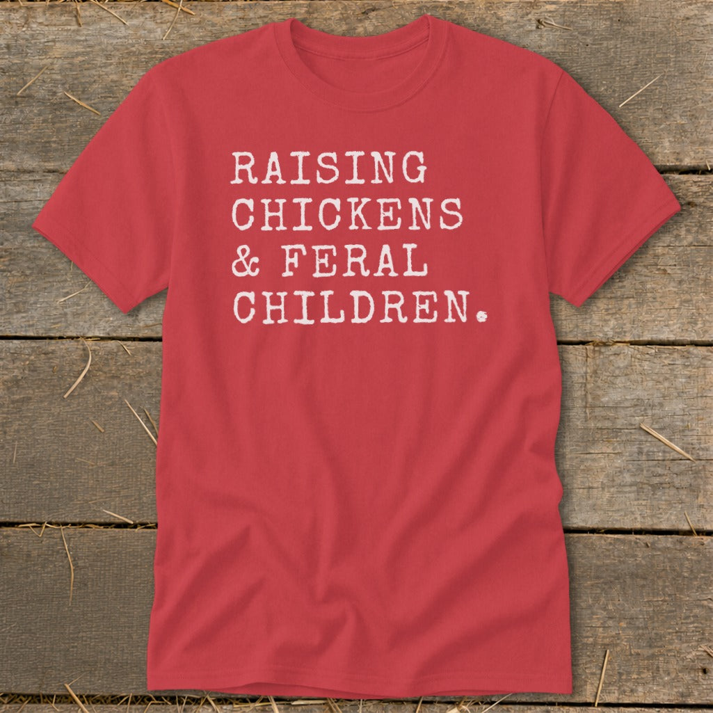 Red t-shirt with white text that reads "RAISING CHICKENS & FERAL CHILDREN."