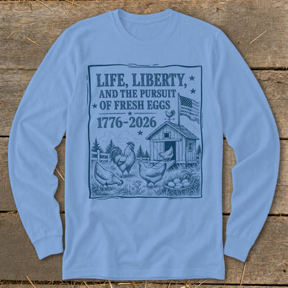 Long-sleeve t-shirt with graphic: "Life, Liberty, and the Pursuit of Fresh Eggs 1776-2026".