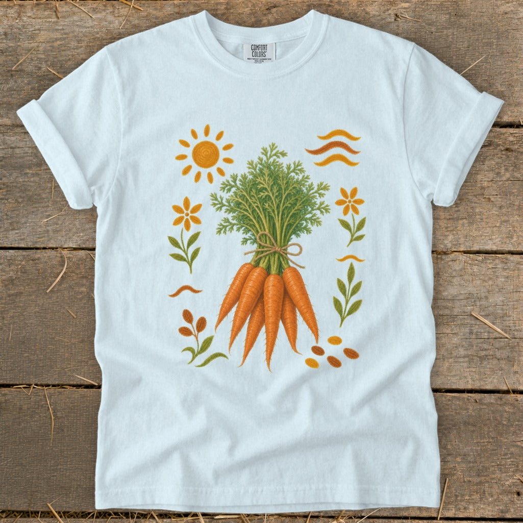 White t-shirt with a graphic of a bunch of carrots and floral accents.