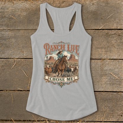 Grey tank top with "Ranch Life Chose Me" graphic of woman on horse with cattle.