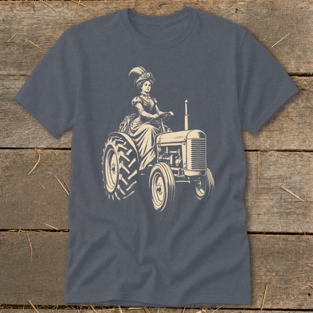 Victorian woman in elaborate dress driving a vintage tractor.