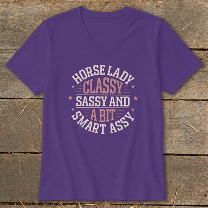Purple v-neck shirt with "Horse Lady Classy Sassy and a Bit Smart Assy" text.