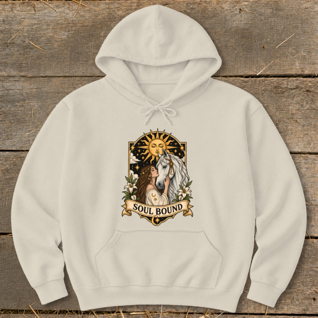 Cream hoodie with "Soul Bound" text and sun, woman, and horse graphic.
