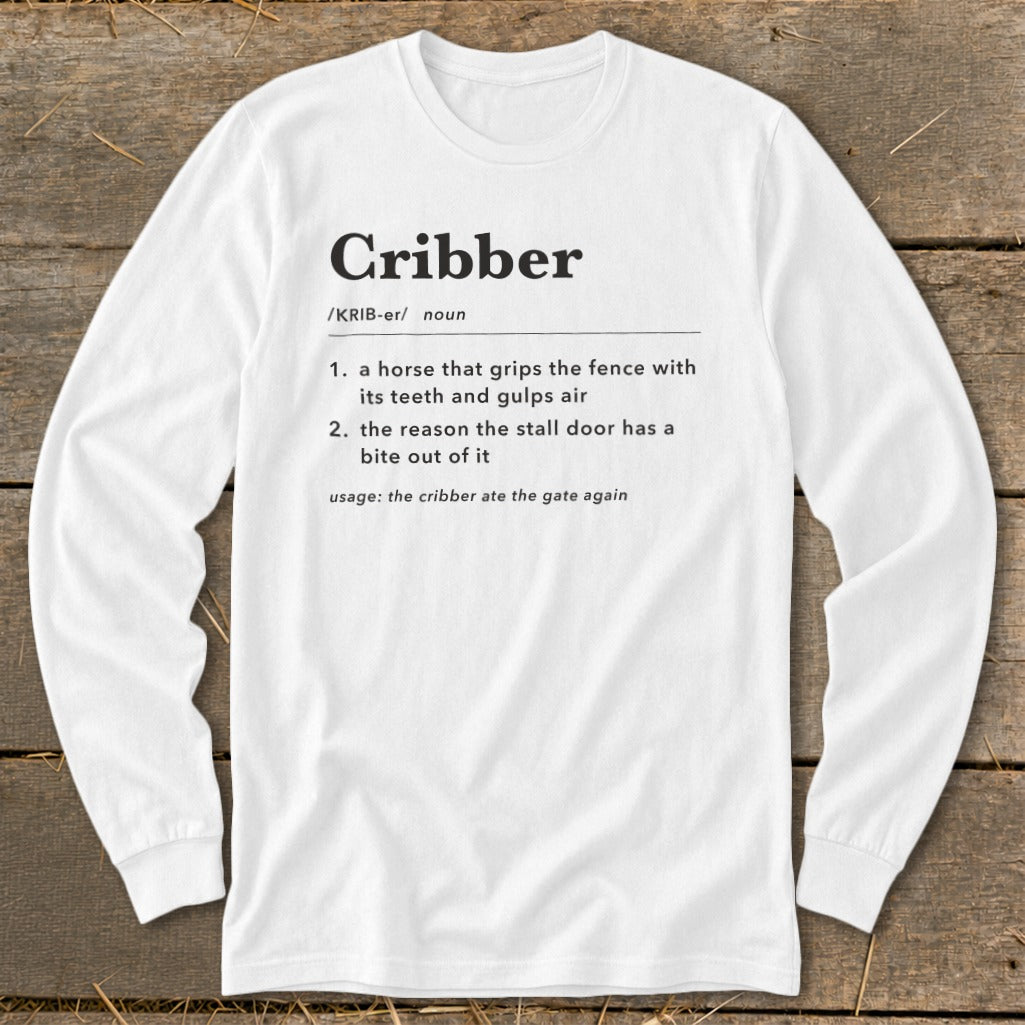 A white long-sleeved t-shirt printed with a humorous dictionary-style definition of the word cribber.
