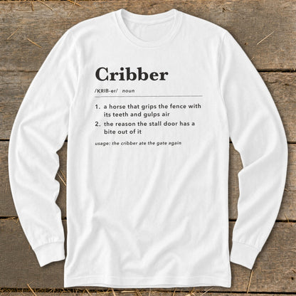 A white long-sleeved t-shirt printed with a humorous dictionary-style definition of the word cribber.