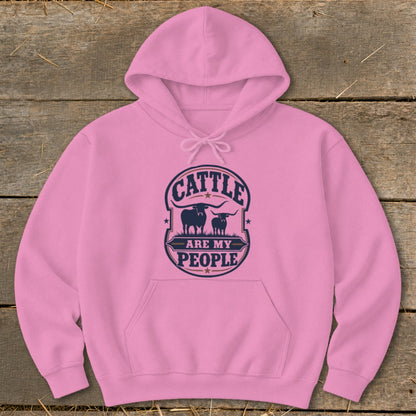 Pink hoodie with "Cattle Are My People" graphic featuring two bull silhouettes.