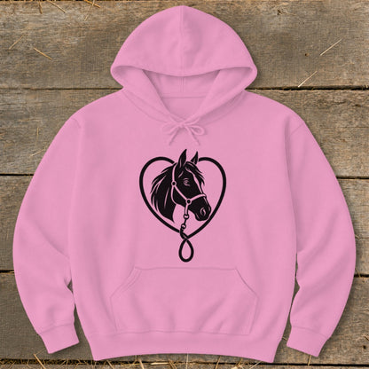 Pink hooded sweatshirt featuring a black graphic of a horse head inside a heart on wood.