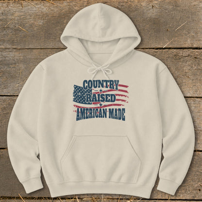 Cream hoodie with distressed American flag and "Country Raised American Made" text.