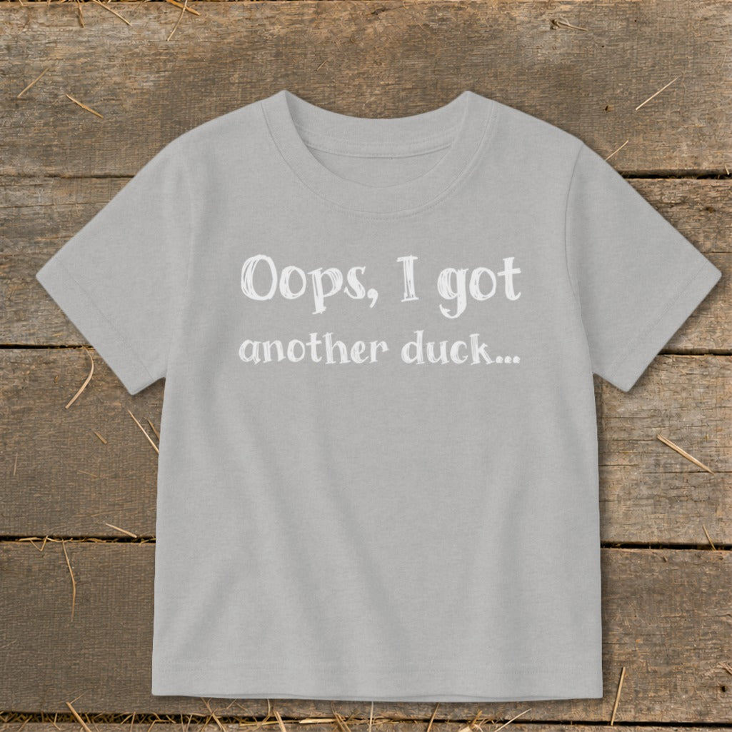 Light grey t-shirt with white text reading "Oops, I got another duck..."