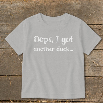 Light grey t-shirt with white text reading "Oops, I got another duck..."