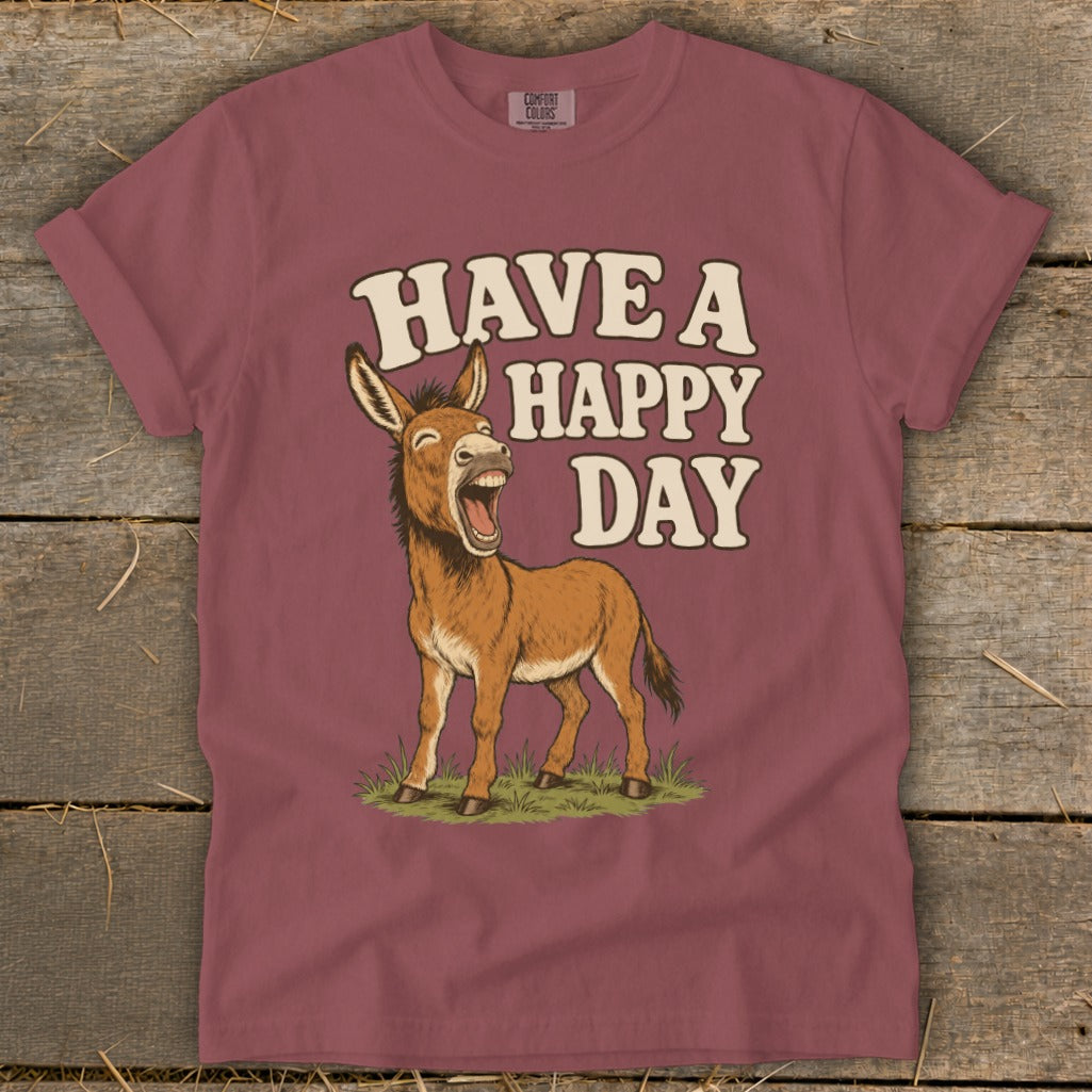 Donkey graphic with text "HAVE A HAPPY DAY" on a burgundy t-shirt.