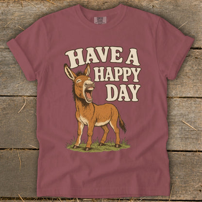 Donkey graphic with text "HAVE A HAPPY DAY" on a burgundy t-shirt.