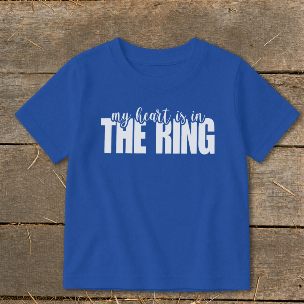 Blue t-shirt with white text "my heart is in THE RING".