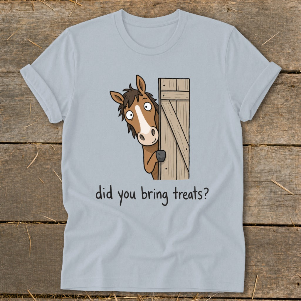 Light blue t-shirt with cartoon horse peeking from behind wooden door, "did you bring treats?" text.
