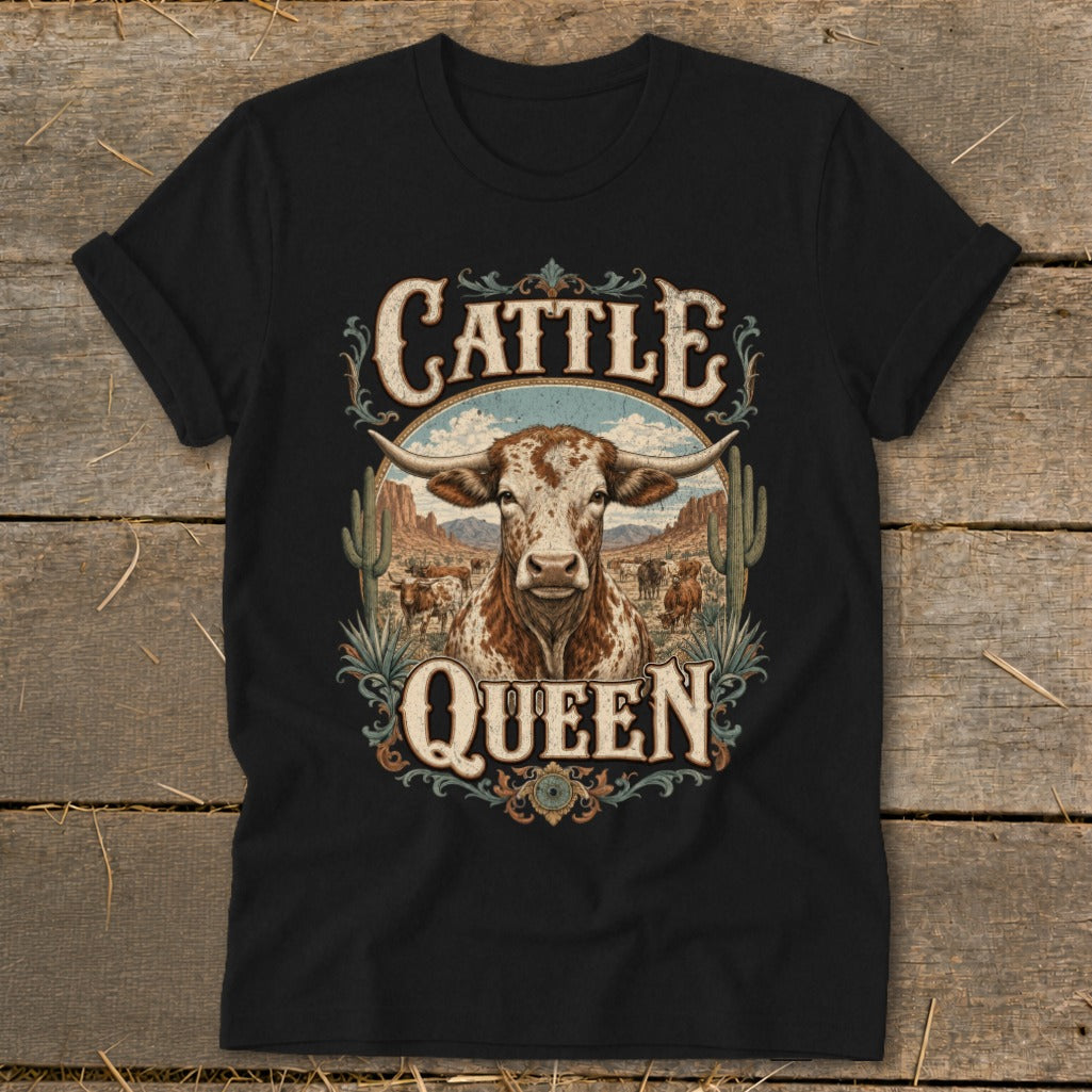 Black t-shirt featuring a Texas Longhorn bull and desert landscape with "Cattle Queen" text.