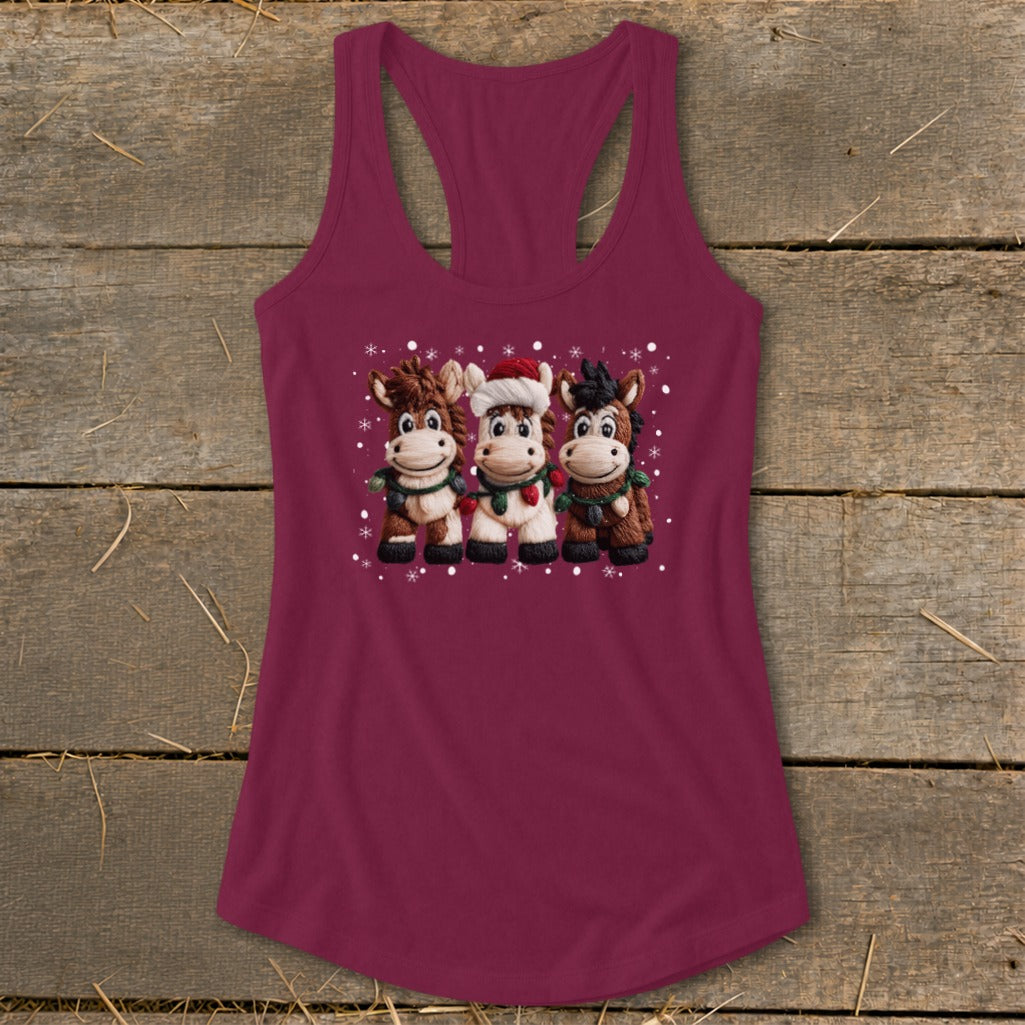 Three cartoon horses in holiday scarves and one in a Santa hat with snowflakes.