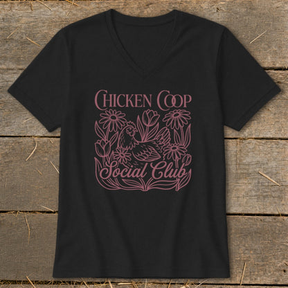 Black v-neck t-shirt with "Chicken Coop Social Club" and a chicken in flowers design.
