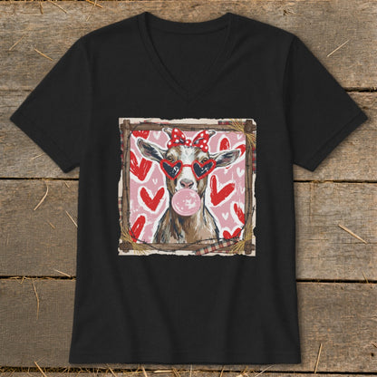 Goat wearing heart sunglasses and a bow, blowing bubblegum against a pink heart background.