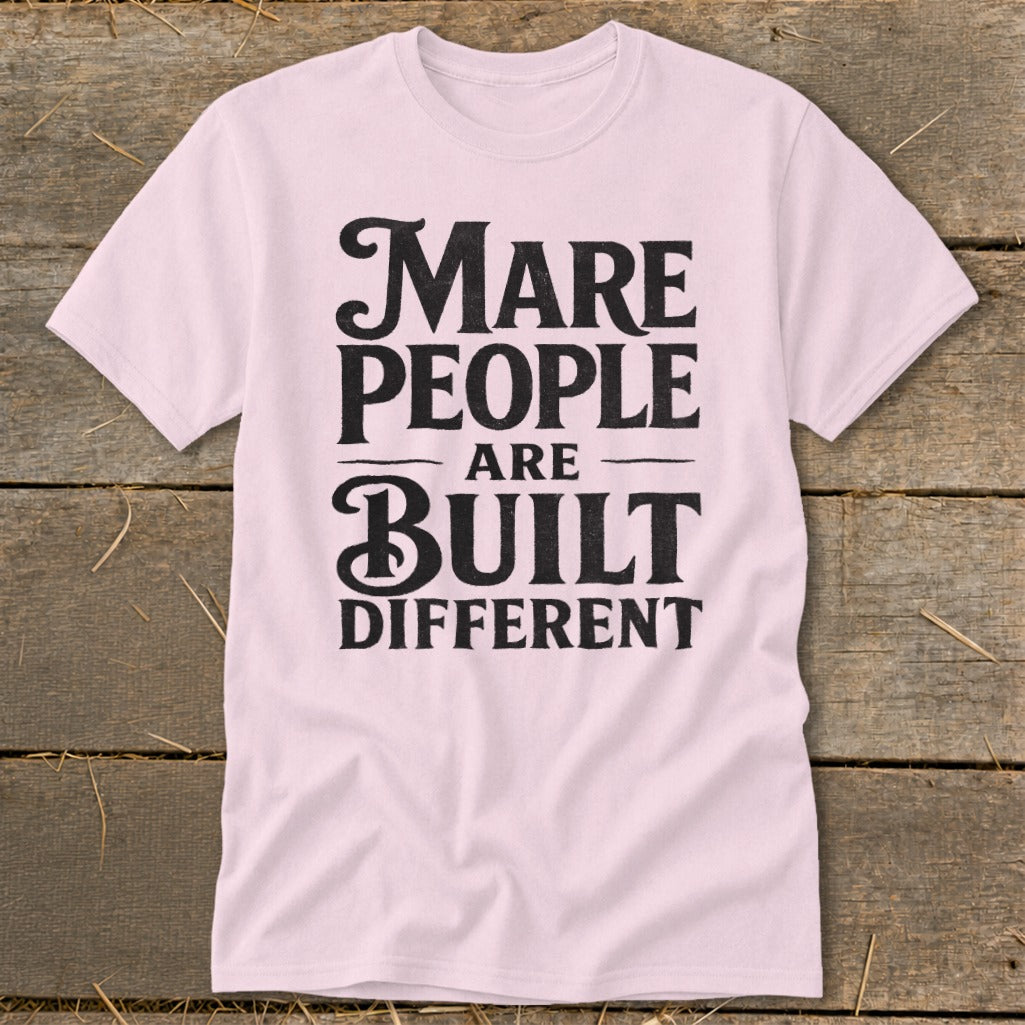 Pink t-shirt with black text that reads "Mare People Are Built Different."