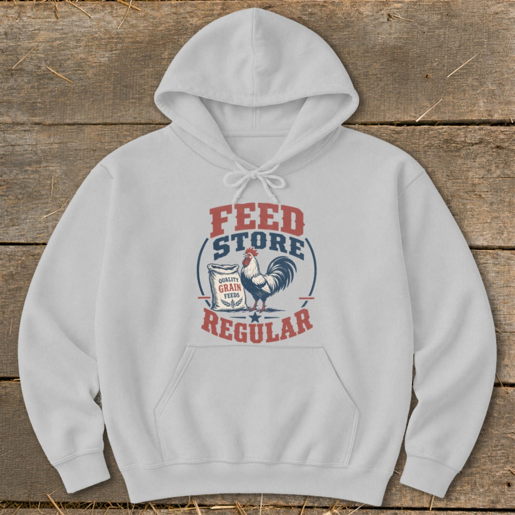White hoodie with "Feed Store Regular" text and a rooster graphic.