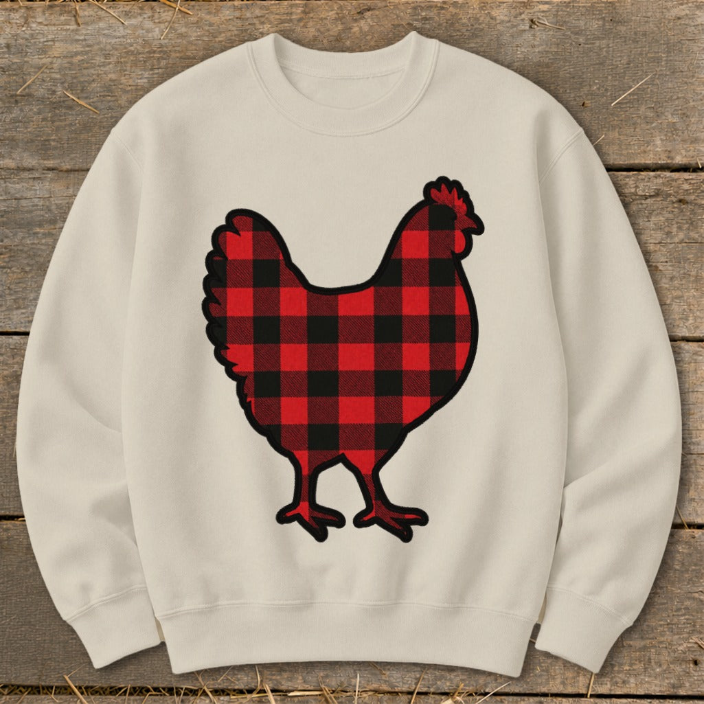Cream sweatshirt with a red and black buffalo plaid chicken graphic.