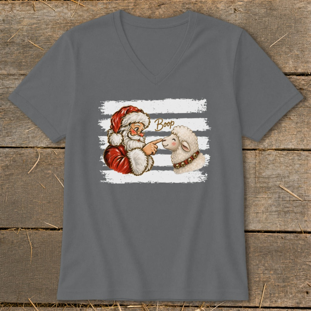 Santa booping a sheep with the word "Boop" above.
