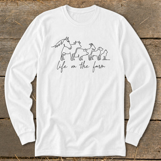 White long-sleeve shirt with farm animals and "life on the farm" text.