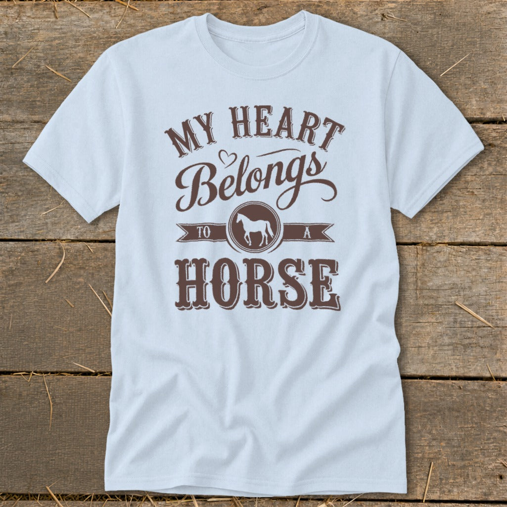 White t-shirt with brown text reading "My heart belongs to a horse" and a horse silhouette.
