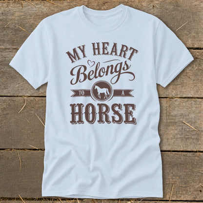 White t-shirt with brown text reading "My heart belongs to a horse" and a horse silhouette.