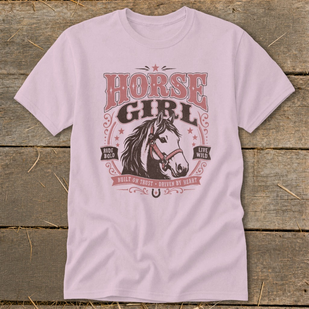Pink t-shirt with "Horse Girl" text and horse graphic, "Ride Bold" and "Live Wild".