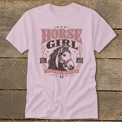 Pink t-shirt with "Horse Girl" text and horse graphic, "Ride Bold" and "Live Wild".