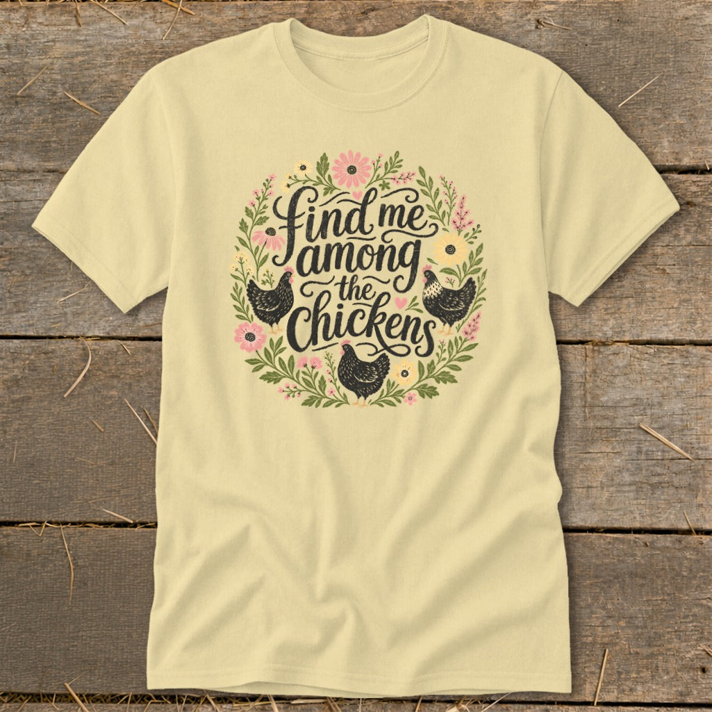 Cream t-shirt with "Find me among the chickens" text and floral chicken graphic.
