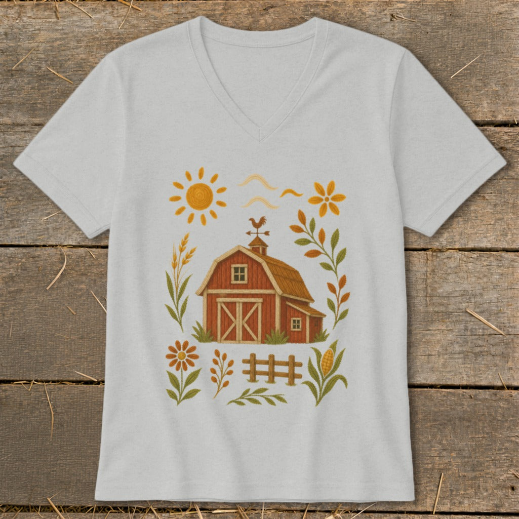 Farm scene with a red barn, sun, flowers, and corn on a light gray t-shirt.