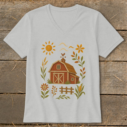 Farm scene with a red barn, sun, flowers, and corn on a light gray t-shirt.