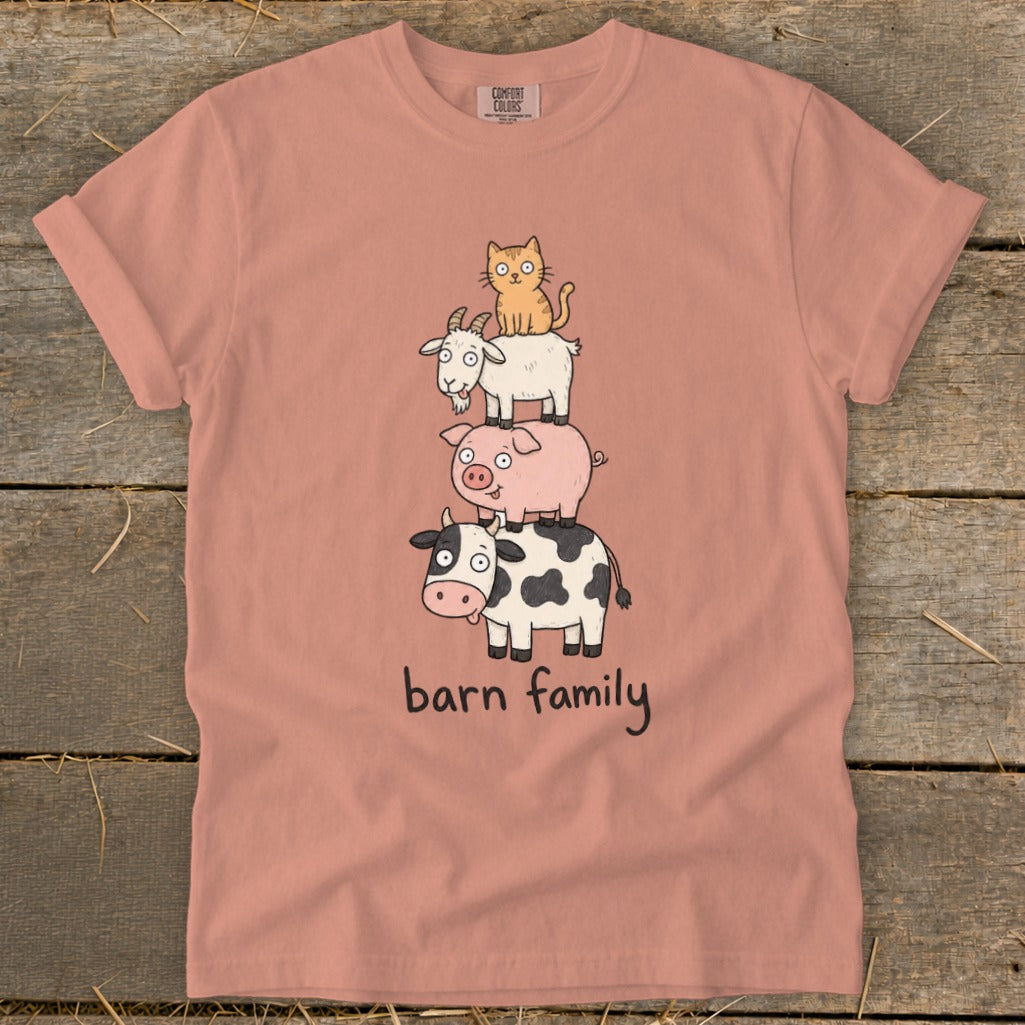 Peach t-shirt with stacked cartoon animals and "barn family" text.