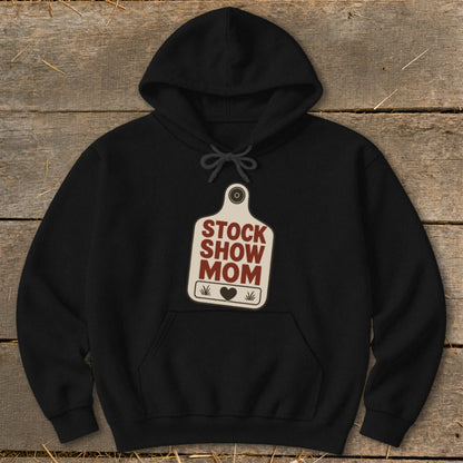 Black hoodie with "Stock Show Mom" graphic on a tag shape.