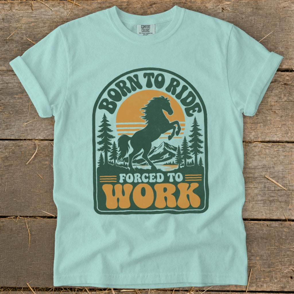 Light blue t-shirt with "Born to Ride" and "Forced to Work" graphic featuring a horse.