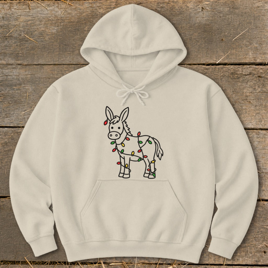 Cream hoodie with a cartoon donkey wrapped in colorful Christmas lights design.