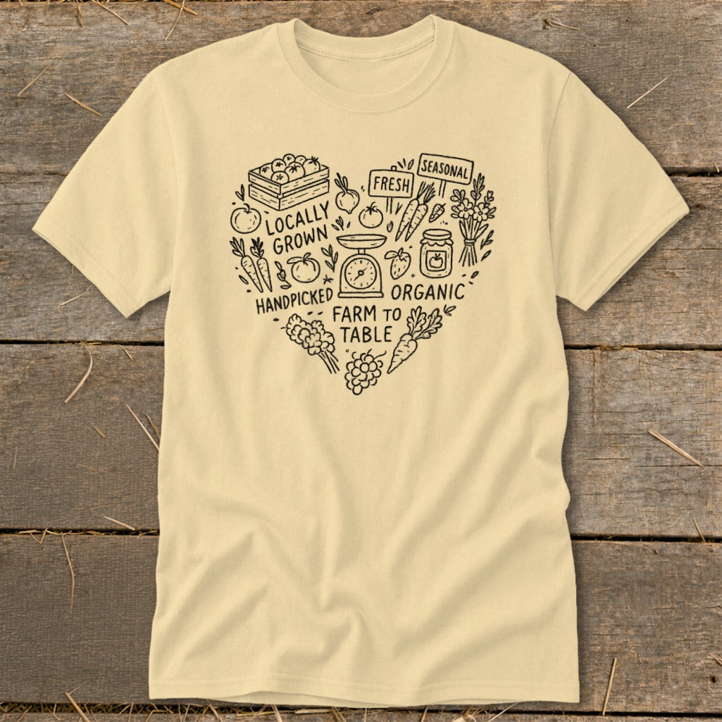 Cream t-shirt with black heart design featuring farm produce and text "Farm to Table".