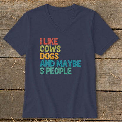 Navy v-neck t-shirt with text "I LIKE COWS DOGS AND MAYBE 3 PEOPLE".