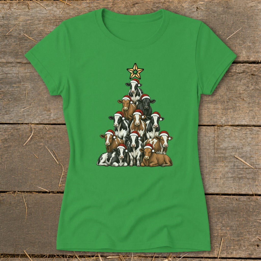 Cows wearing Santa hats stacked in a Christmas tree shape, topped with a star.