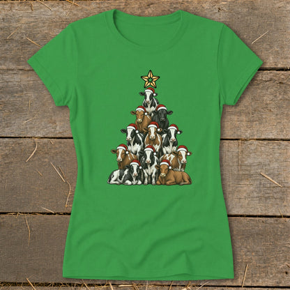 Cows wearing Santa hats stacked in a Christmas tree shape, topped with a star.
