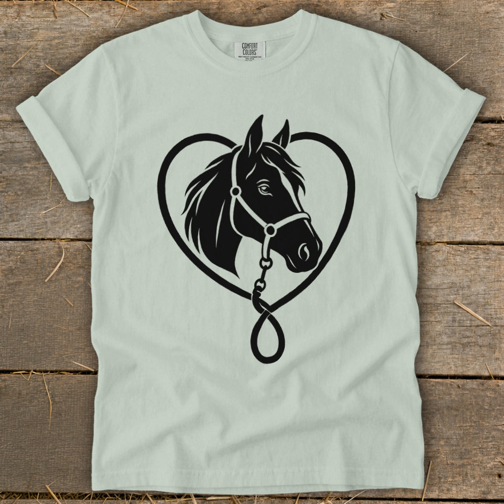 Light green t-shirt with a black graphic of a horse's head framed inside a heart.
