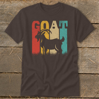 Dark t-shirt with a retro graphic featuring a goat silhouette and the word "GOAT".