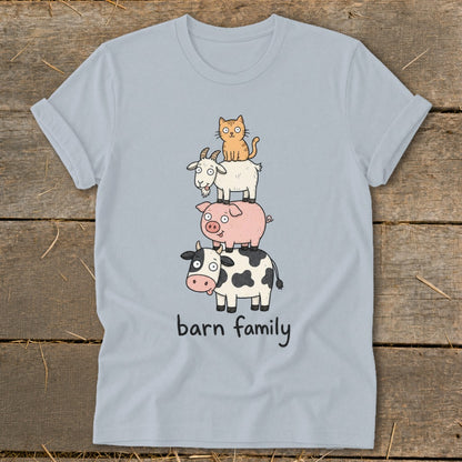 Light blue t-shirt with cartoon cow, pig, goat, and cat stacked, reading "barn family".
