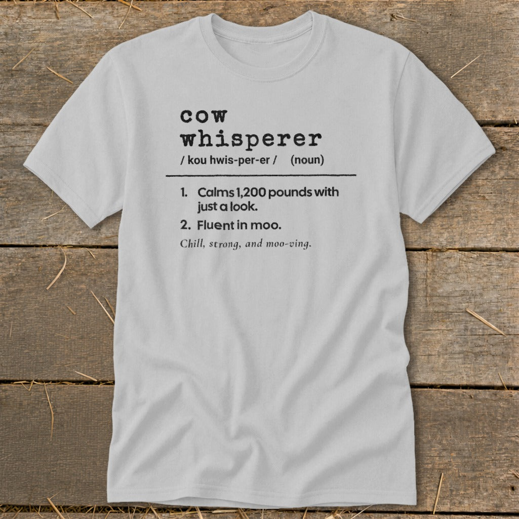 Gray t-shirt with "cow whisperer" definition printed on it.